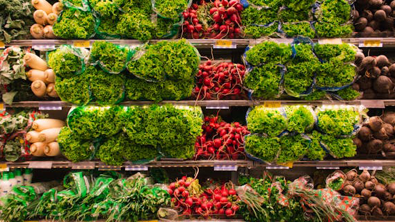 People shopping in a grocery store.